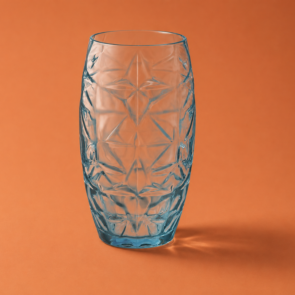 Blue glass vase with star patterns on an orange background