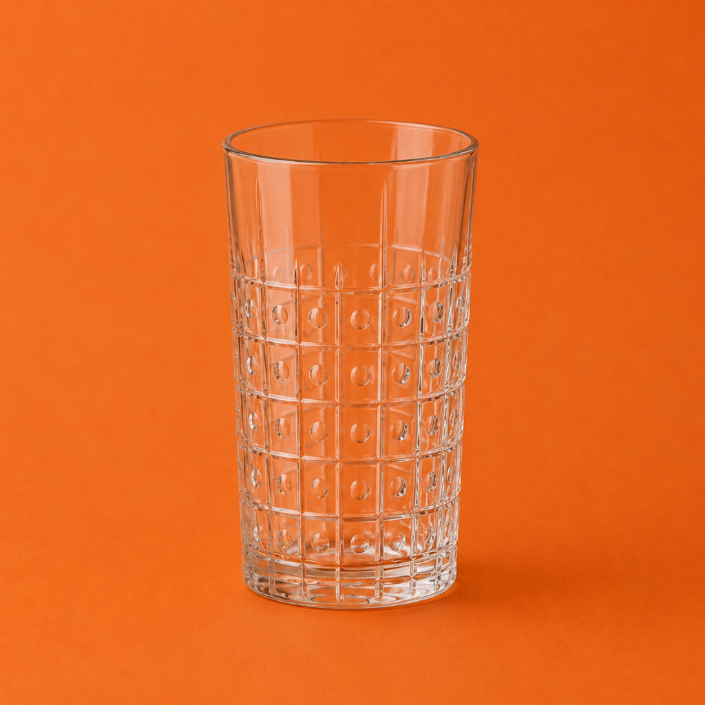 Clear glass with a textured pattern on an orange background