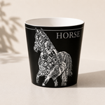 Black mug with horse illustration and HORSE text on a beige background