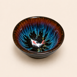 Ceramic bowl with artistic interior design on a beige background