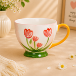 Mug with floral design on a beige surface