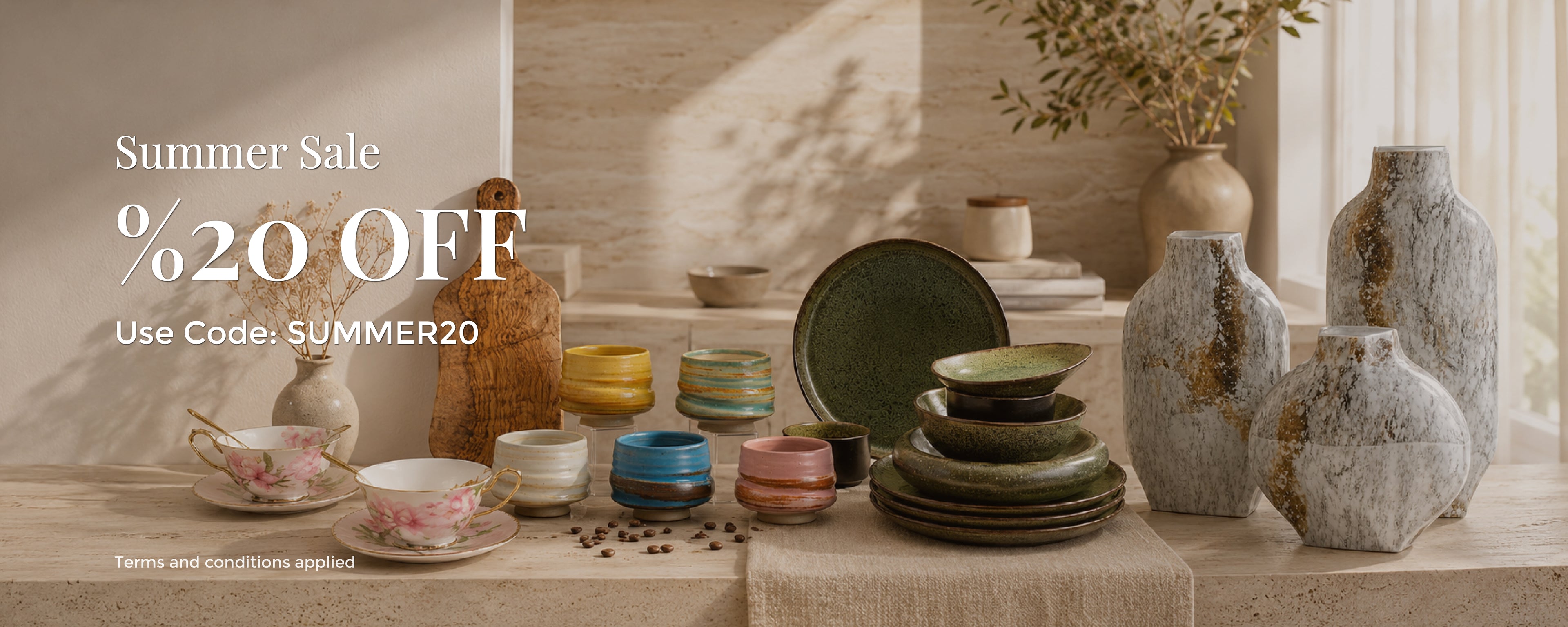 A styled tabletop display of ceramic tableware and vases in warm neutral tones, with text on the left reading 'Summer Sale %20 OFF Use Code: SUMMER20'. The products include stacked plates, bowls, cups, a teacup and saucer, and several textured vases.